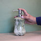 Green marble painted curved dispenser